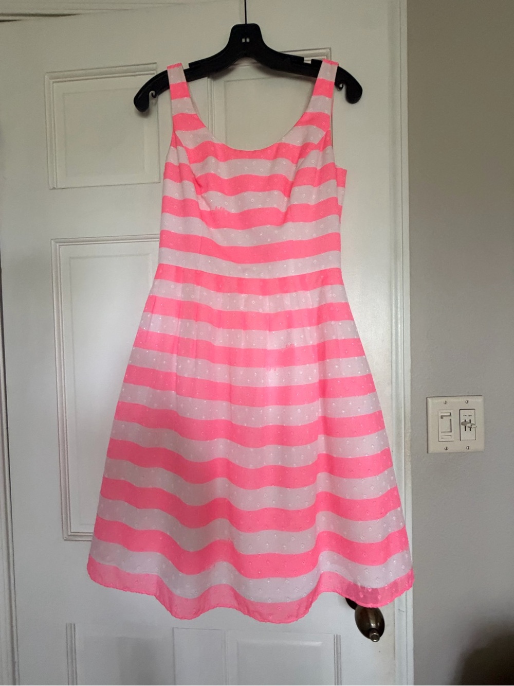 Lilly Pulitzer Posey Dress in the “Sparkle Pink Awning Stripe” colorway.